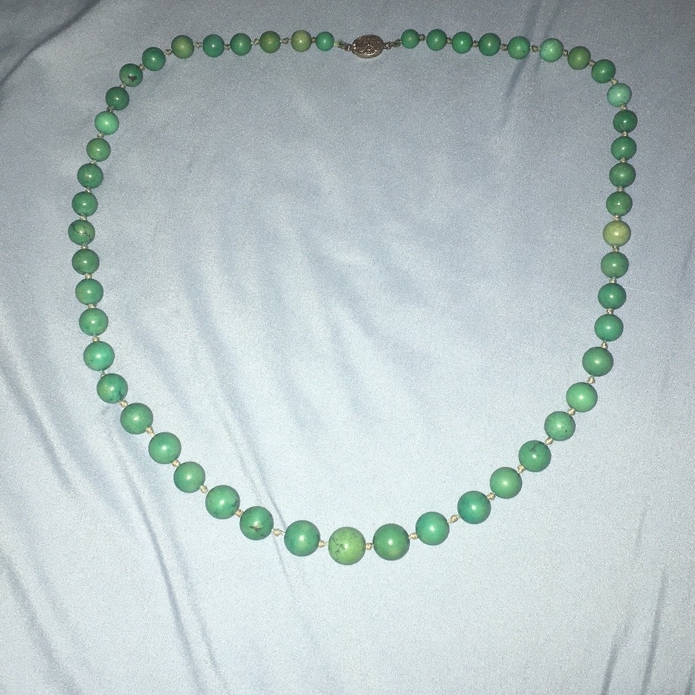 Necklace with turquoise colored beads
